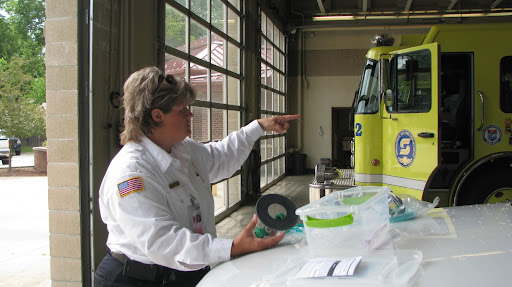 Julie explains that the Fire Department has been provided with a few more of these masks and is working hard to distribute the remaining to the other Stations here in Springfield Missouri. (Photo by: Brittni Bynum)