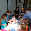 Parents and volunteers help out.