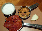 Ingredients for a sundried tomato pesto.