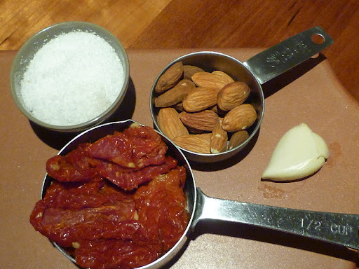 Ingredients for a sundried tomato pesto.