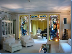 8115 Graceland, Memphis, Tennessee - Graceland Mansion - living room with music room at back 8115 Graceland, Memphis, Tennessee - Graceland Mansion - living room with music room at back