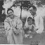 TJ Howard, Hattie Pack Howard, and Freda (child).