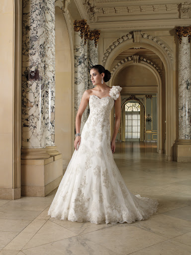 The darker beading on this David Tutera gown really adds drama. The darker beading on this David Tutera gown really adds drama.