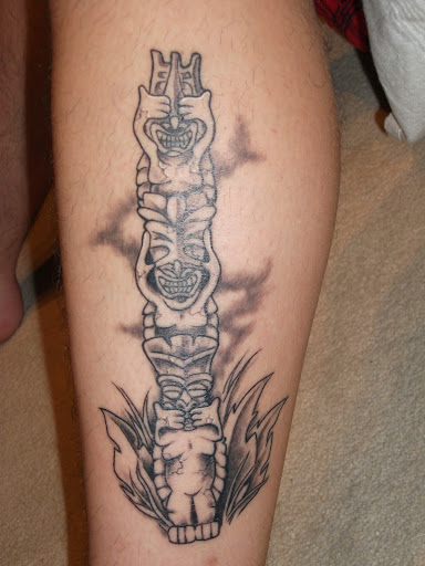 Totem pole tattoo with the see no evil hear no evil speak no evil