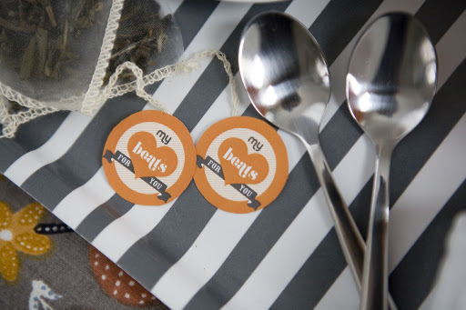 This DIY project is simple to do: Replace tea-bag labels with your own cute tags.