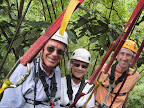 Tethered to the tree for safety while waiting to zip-line