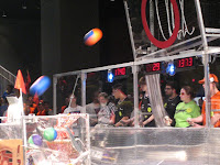 Our robot shooting in three pointers
