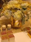 More of our table, check out the Martha Stewart Crafts glitter, we glittered the tops of favor boxes for a little extra bling,