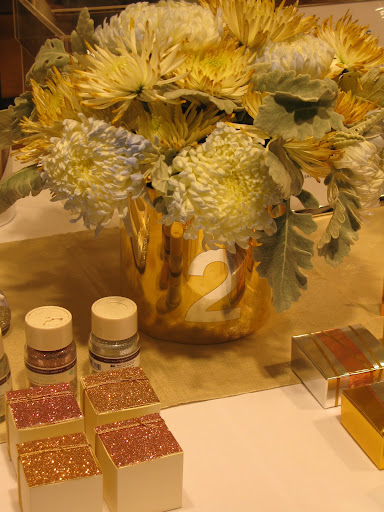 More of our table, check out the Martha Stewart Crafts glitter, we glittered the tops of favor boxes for a little extra bling,