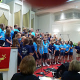 Soundchecking both choirs Soundchecking both choirs