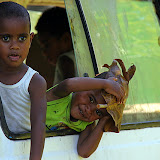 Local Children Play In A Broken Down Minivan - Port Denarau, Fiji