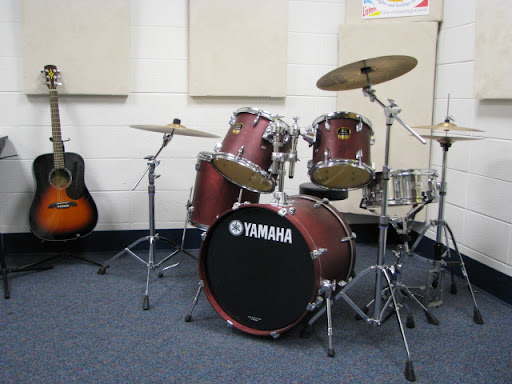 Community music instructors come by to jam with the kids in the Music Room.