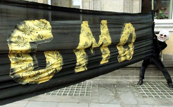 Protesters on the streets of Warsaw in March 2012, trying to raise awareness of the effects of pesticides on honeybees. Photo: Radek Pietruszka / European Pressphoto Agency