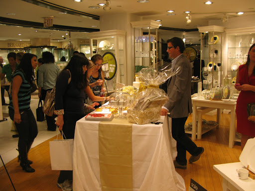 Anthony Luscia, Special Projects Editor chats with brides at our table, inspired by current Fall issue's metallic color palette story.