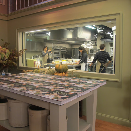 Looking into the test kitchen before filming, all the cooks are wearing black. And look under the counter–remember the big pickle jar my colleague Yvette found in a flea market? I told you Martha loves them!