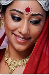 Bengali bride adorned with small bindis