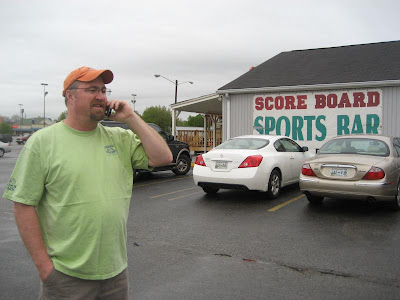 Don Middlebrook being interviewed via cell phone by DJ Jeff Allen live on air during the launch party for the new Sandbar Radio show. Don is standing outside the Scoreboard sports bar just before he began his show for the PHINS club.