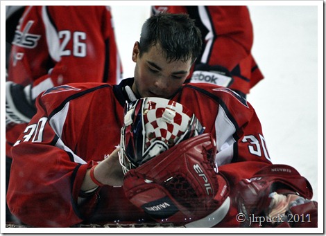 Checking his mask