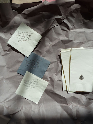 ForYourParty.com foil-pressed the cocktail napkins with a quote from a love letter written by Napoleon to Josephine. They also used this same treatment on hand towels for the restrooms.