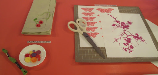 The silhouettes are made by scanning clip art onto iron-on transfer paper.