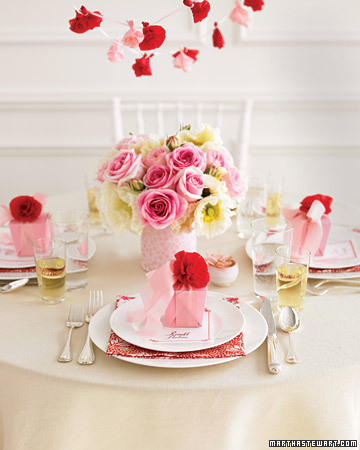 The contrast between pale pink and bright red in this floral tablescape will wow your guests. Calm, delicate pinks can actually serve to highlight more passionate bold accents. The contrast between pale pink and bright red in this floral tablescape will wow your guests. Calm, delicate pinks can actually serve to highlight more passionate bold accents.