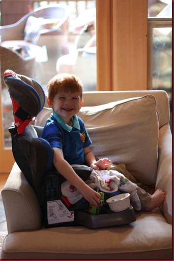 Loving his new car seat