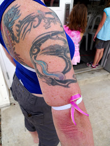 One of the staff custom-made pink ribbon armbands for the whole team to wear in support of Trish.