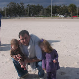 Brent with the girls on the beach.