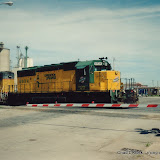CNW_6934_SD40-2_blt1976_Later-UP-3097_UP_6095_SD60M_NE-Fremont_S-Main-Street_E-1st-St_1999-08_002.jpg