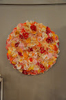 A beautiful wreath of paper flowers by The Green Vase (http://thegreenvase.com).