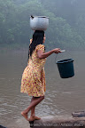 A woman collects fresh water at dawn in the Kandoshi community of Pifayal where we spent the night on the way to the Achuar meeting in Kuyuntsa. We were greeted by the entire village and enjoyed a hearty meal of huangana (wild boar) and patarashca.  In the early morning we departed for Kuyuntsa.