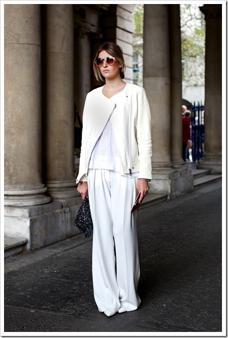 LFW-LONDON-FASHION-WEEK-STREETSTYLE-SS-SPRING-SUMMER-2013-FALL-WHITES-ALL-WHITE-LOOK-MOTO-JACKET-WHITE-TEE-TSHIRT-WIDE-LEG-PANTS-CLUTCH-ROUND-SUNGLASSES-MINIMAL-CHIC-SIMPLE-WATCH-VIA-VOGUE-UK