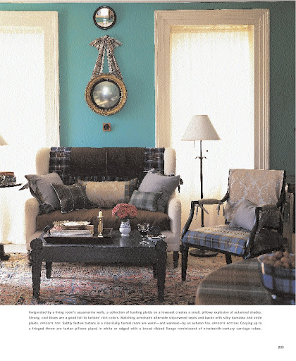 A collection of hunting plaids on a loveseat creates a small, pillowy explosion of autumnal shades. A collection of hunting plaids on a loveseat creates a small, pillowy explosion of autumnal shades.