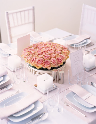 Pink Roses Arrangement. (marthastewartweddings.com)