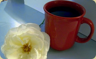 coffee and a flower coffee and a flower