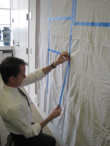I pinned the tablecloth up in my office and began to tape out napkins.