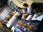 Journalists with wire services EFE and AFP listening in to a response from CEJIL Director Viviana Krsticevic. Photo: Andrew Miller / Amazon Watch