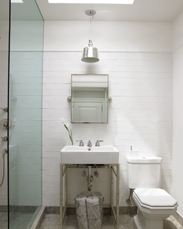 Perhaps the most contemporary room in the apartment, the bathroom is luxurious yet basic, with clean lines and an abundance of natural light provided by a skylight. Eric decided on a glass shower without a door to make the room feel as spacious as possible. Perhaps the most contemporary room in the apartment, the bathroom is luxurious yet basic, with clean lines and an abundance of natural light provided by a skylight. Eric decided on a glass shower without a door to make the room feel as spacious as possible.
