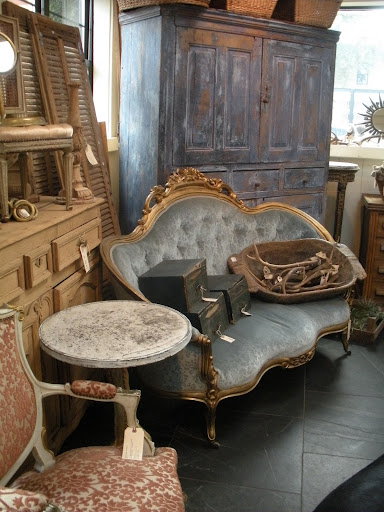 I always gravitate towards furniture with interesting finishes and colors. That large corner piece has caught my eye.