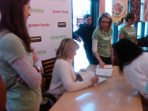 Martha smiled as she signed copy after copy, greeting and chatting with fans. (Alex Postman, WL's ed-in-chief, at left)