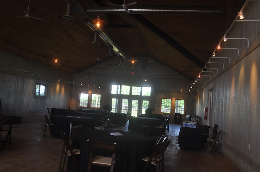 The barn fits 200 and oozes rustic charm. The fresh-cut wood smell made us all fall in love.