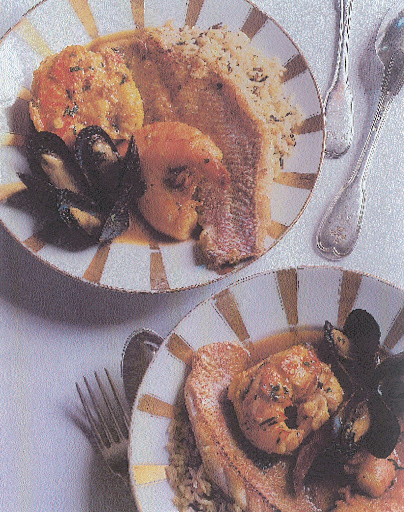 Caribbean-influenced bouillabaisse served over wild rice in Old Paris porcelain bowls. (Martha Stewart Living) Caribbean-influenced bouillabaisse served over wild rice in Old Paris porcelain bowls. (Martha Stewart Living)