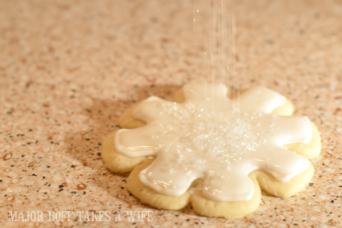 Sugar Cookies being decorated with sanding sugar. Christmas Snowflake Sugar Cookies : How to make icing and decorate. A wonderful step by step tutorial on how to make icing. You won't believe how easy it is to make! One of your favorite Christmas Cookie recipes will look stunning and elegant and truly worthy of gift giving! Because who doesn't love sugar cookies? Part of the Holidays Made Easy blog series. #HolidaysMadeEasy Sugar Cookies being decorated with sanding sugar. Christmas Snowflake Sugar Cookies : How to make icing and decorate. A wonderful step by step tutorial on how to make icing. You won't believe how easy it is to make! One of your favorite Christmas Cookie recipes will look stunning and elegant and truly worthy of gift giving! Because who doesn't love sugar cookies? Part of the Holidays Made Easy blog series. #HolidaysMadeEasy