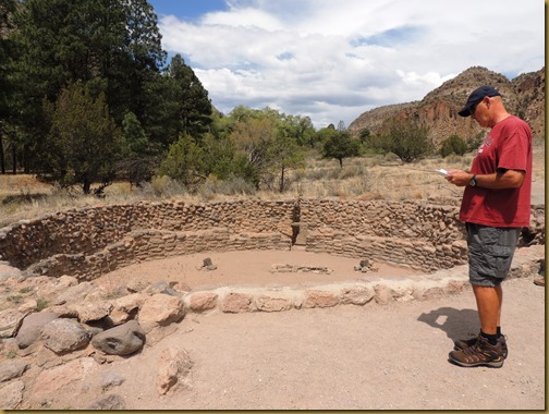 Vic reads the brochure that explains the purpose of the Kiva Vic reads the brochure that explains the purpose of the Kiva