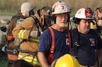 Chief Wyatt and Asst. Chief from Catuala, Allen Kitts in background preparing his SCBA