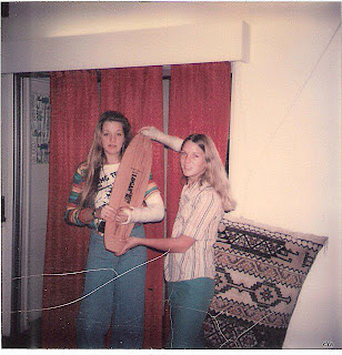 Robin Allway and Robin Logan holding a Brad Logan (Oak) model.