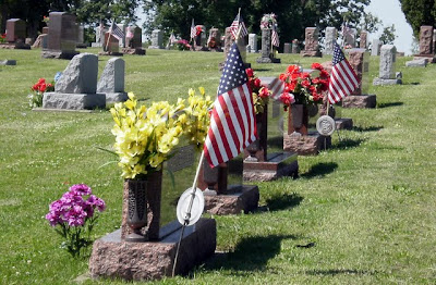 Veterans' graves in Pella's Oakwood Cemetery