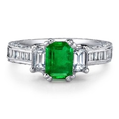 Emerald Cut Emerald and Diamond Three Stone Ring in Platinum
