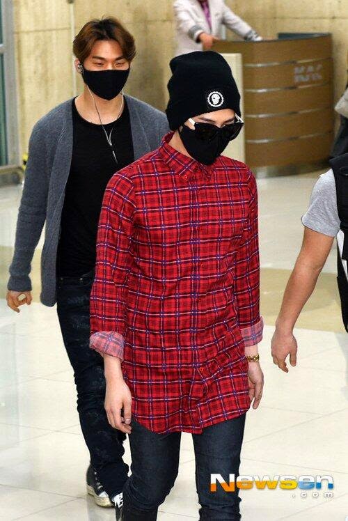 G-Dragon - Gimpo Airport - 14apr2014 - Press - Newsen - 1.jpg