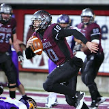 Jordan Johnson scrambles from the UNI defense and runs upfield.